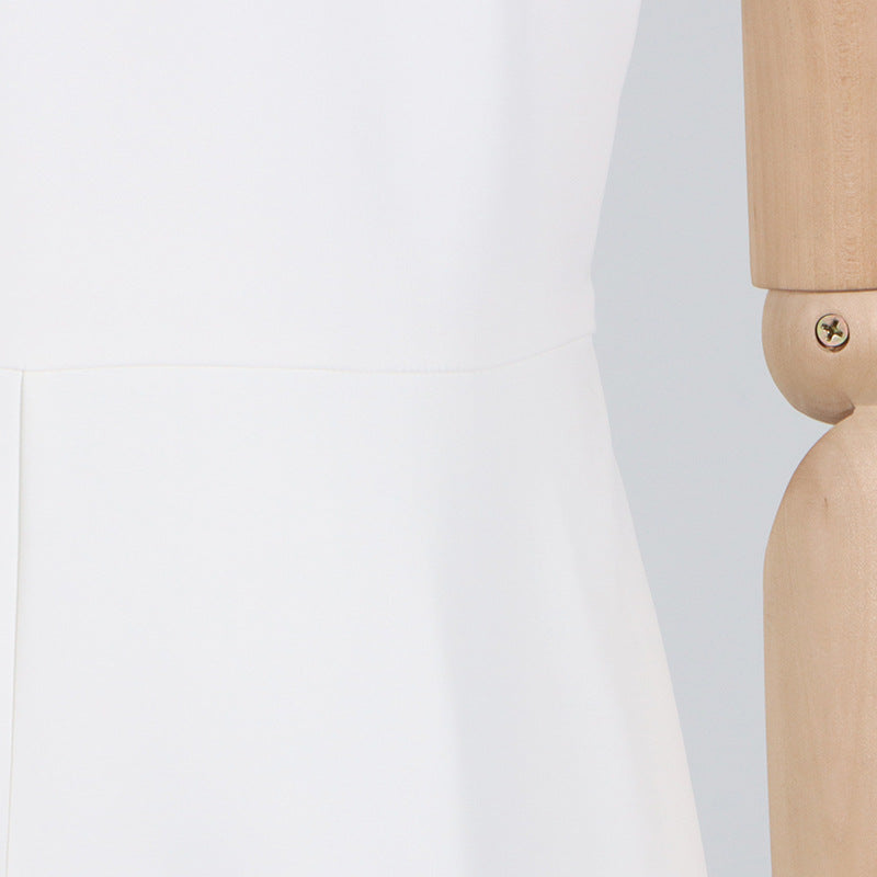 Wooden mannequin arm showcasing elegant fashion for ملابس and stylish summer dresses