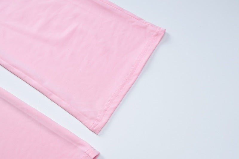 Pink fabric corners of the Slim Fit High Waist Suit highlighting high waist design