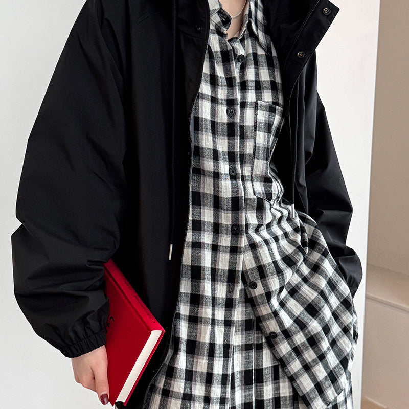 Black hooded jacket over plaid shirt dress displayed in Super Elegant Hooded Jacket for fashion and ملابس