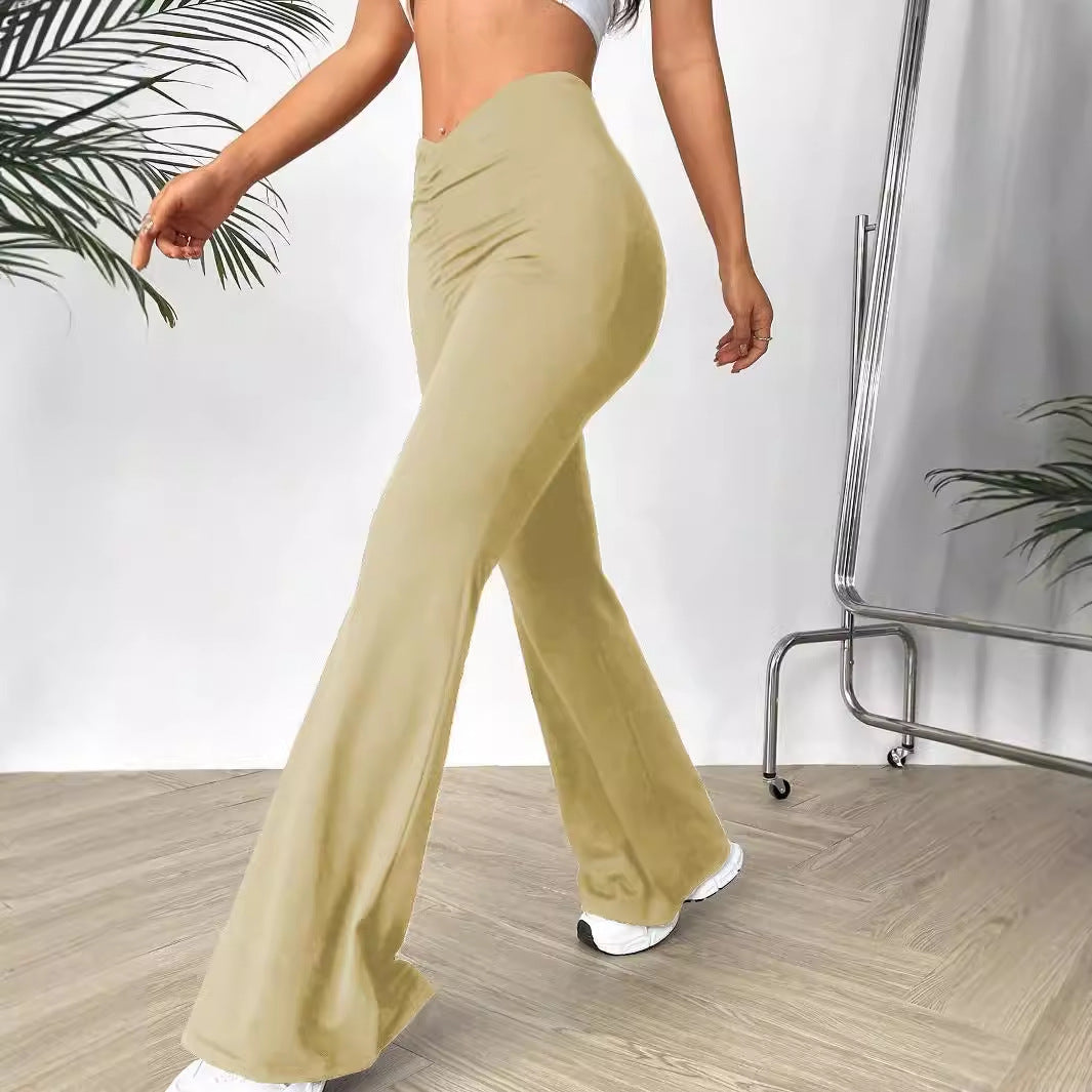 High-waisted slimming bootcut trousers with front ruching and shaped waist design