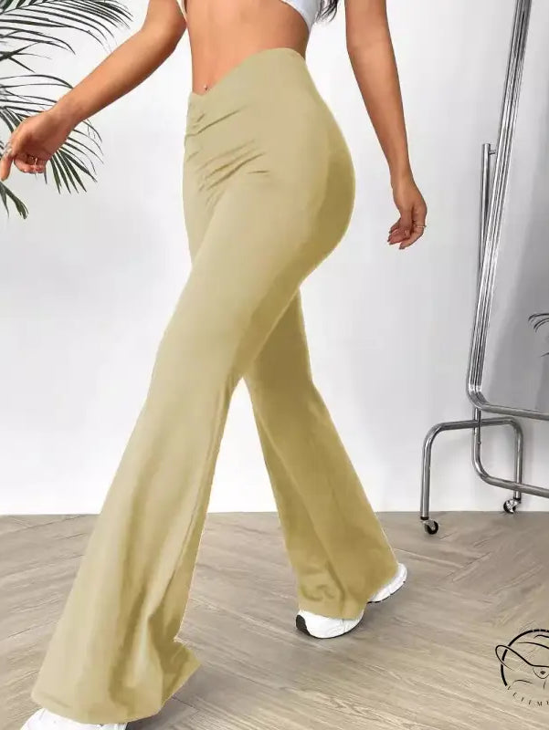 V shaped waist slimming bootcut trousers with high-waisted flared design