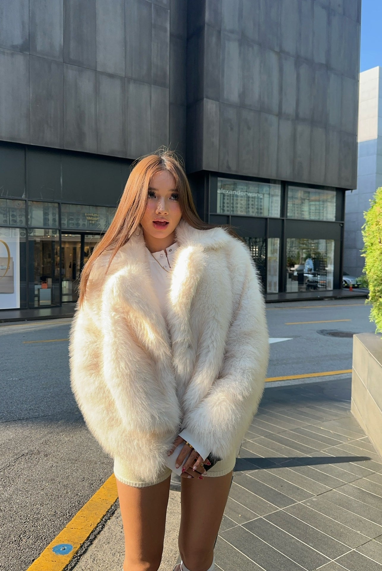 Cream faux fur oversized coat with high collar and pockets by Langry fashion