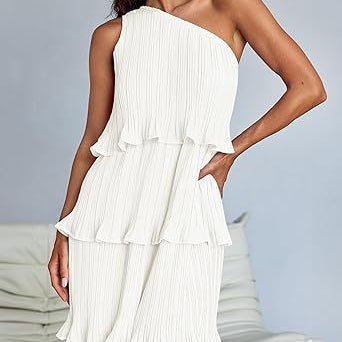 White one-shoulder layered stitching hem pleated dress showcasing stunning shoulder style