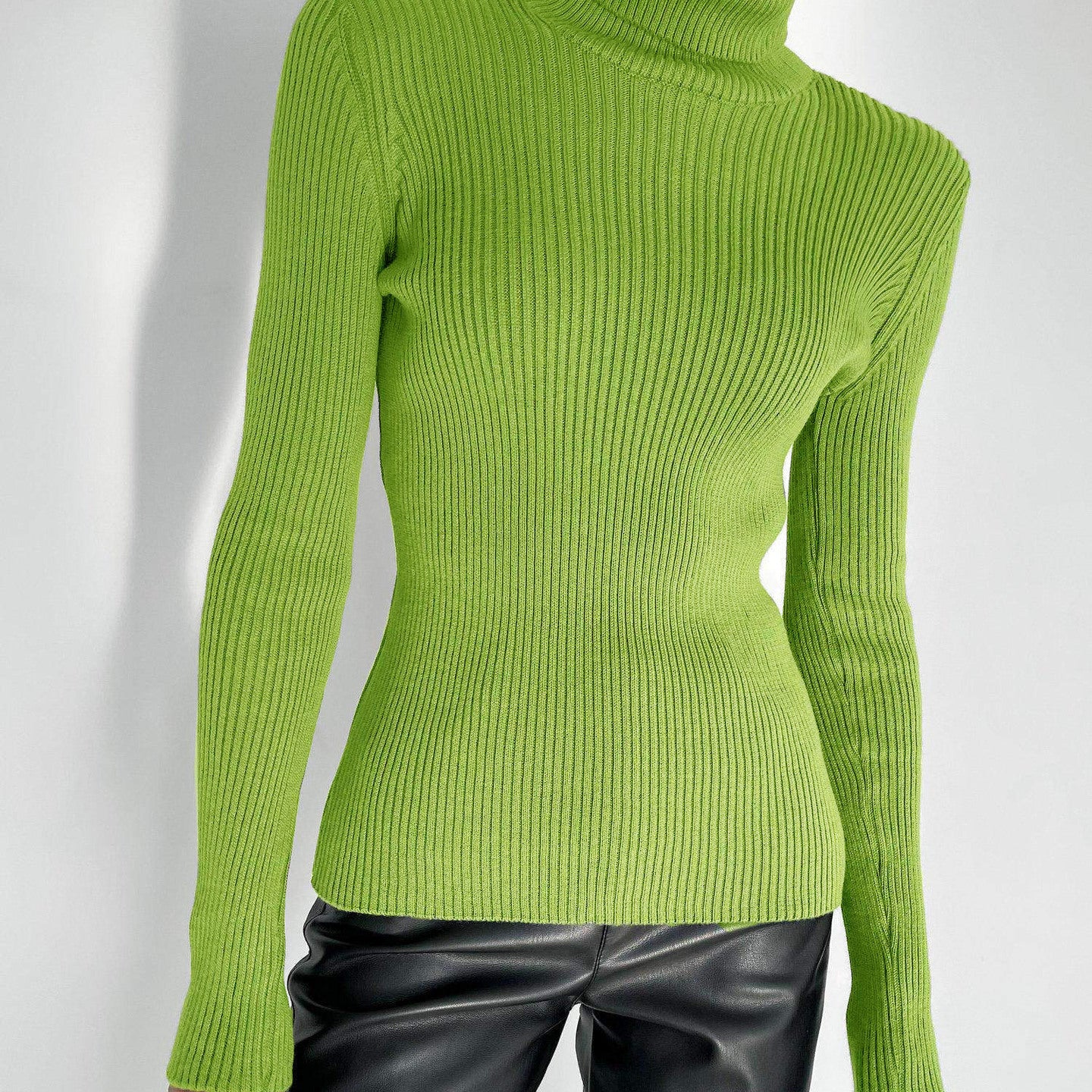 Lime green ribbed langry fashion turtleneck sweater with black leather pants