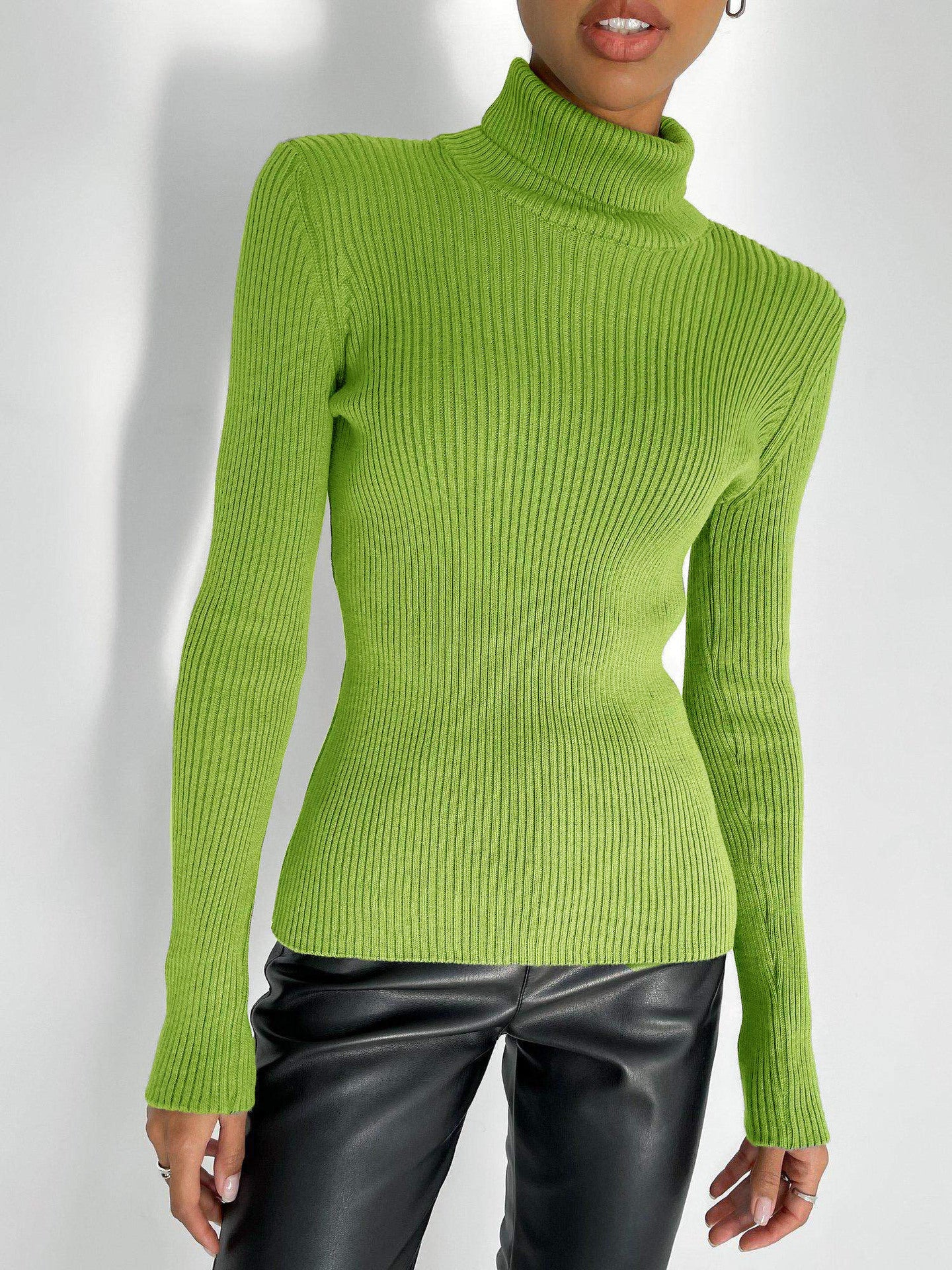 Lime green ribbed langry fashion turtleneck sweater with black leather pants