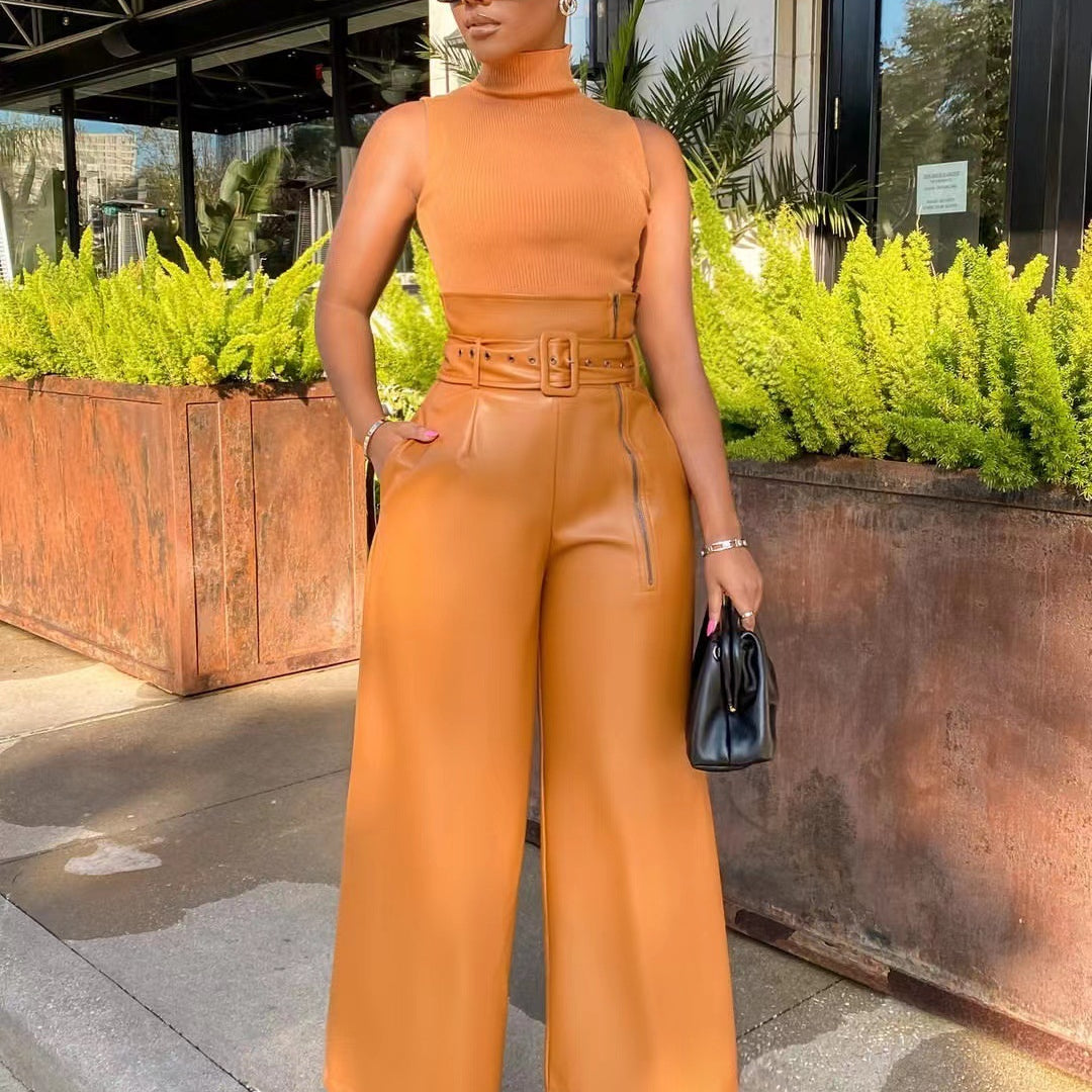 Woman wearing high waist faux leather pants and matching top in tan color
