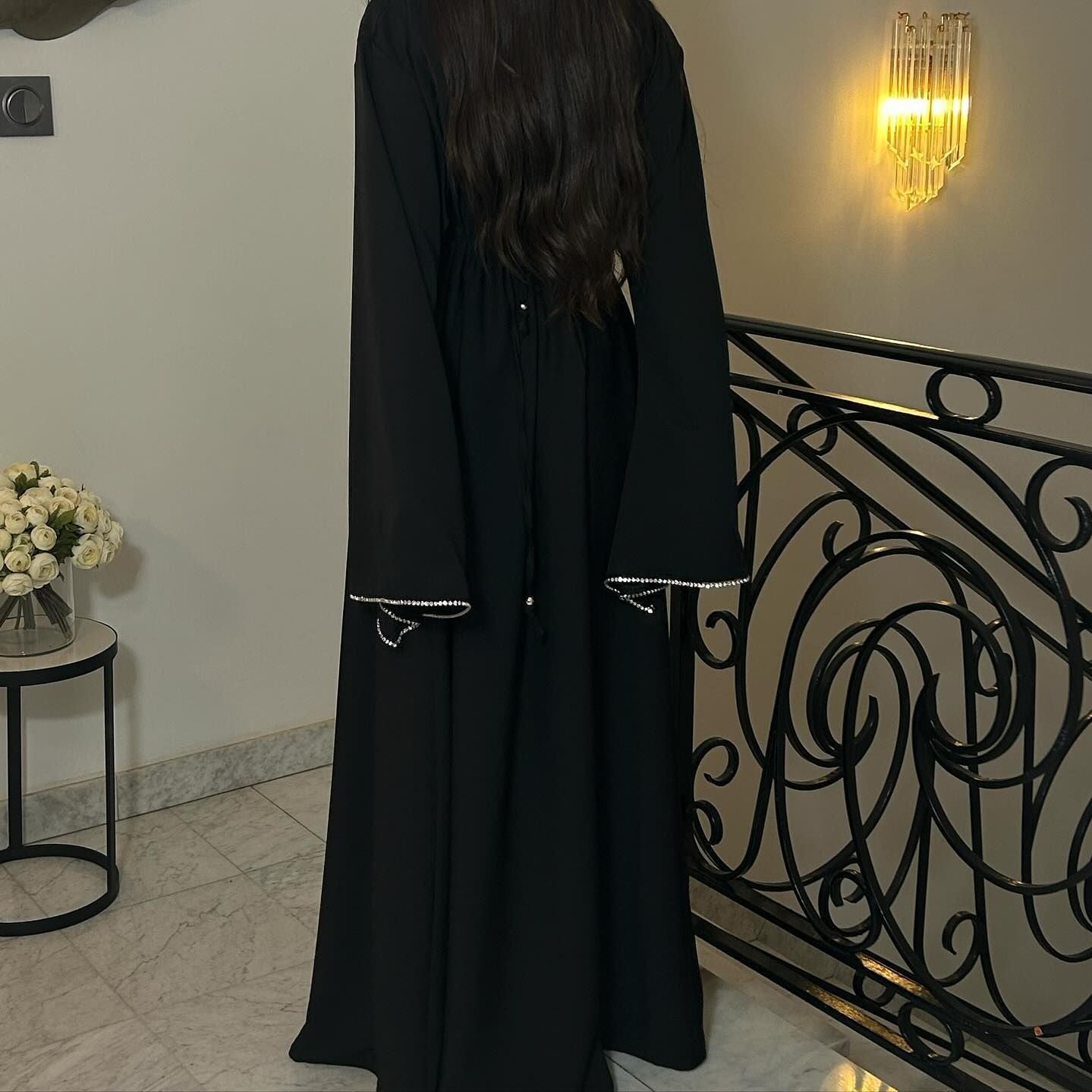 Black abaya with embellished cuffs in Elegant Diamond Dress showcasing contemporary fashion ملابس