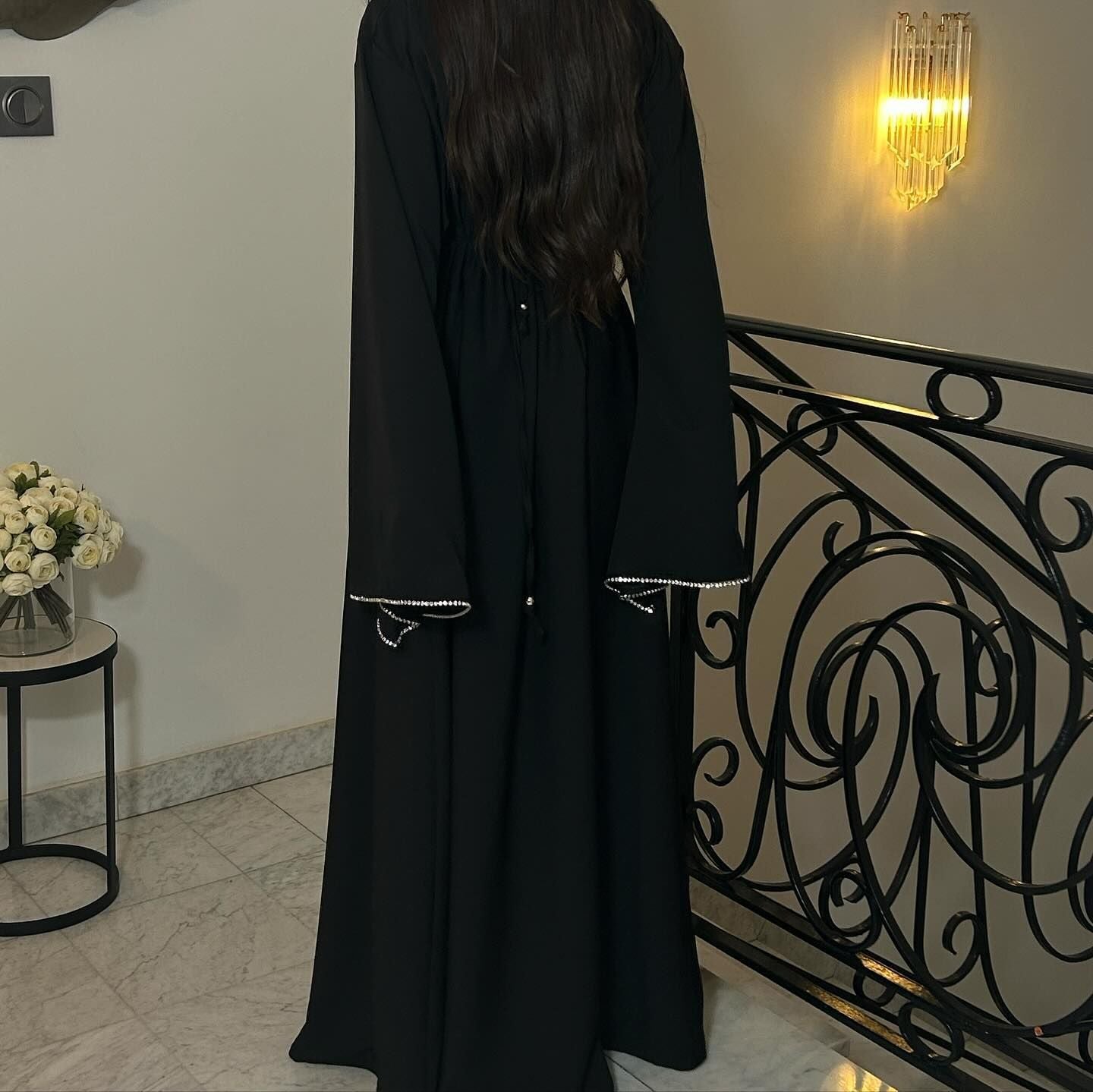 Black abaya with embellished cuffs in Elegant Diamond Dress showcasing contemporary fashion ملابس