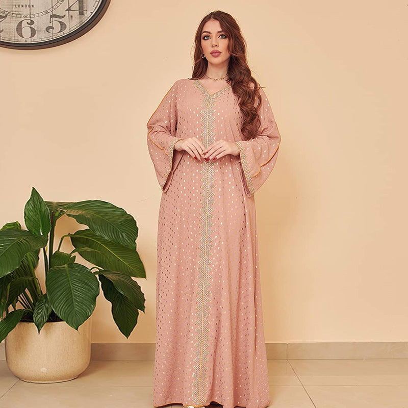 Elegant dusty rose langry abaya with intricate embroidery and flowing sleeves