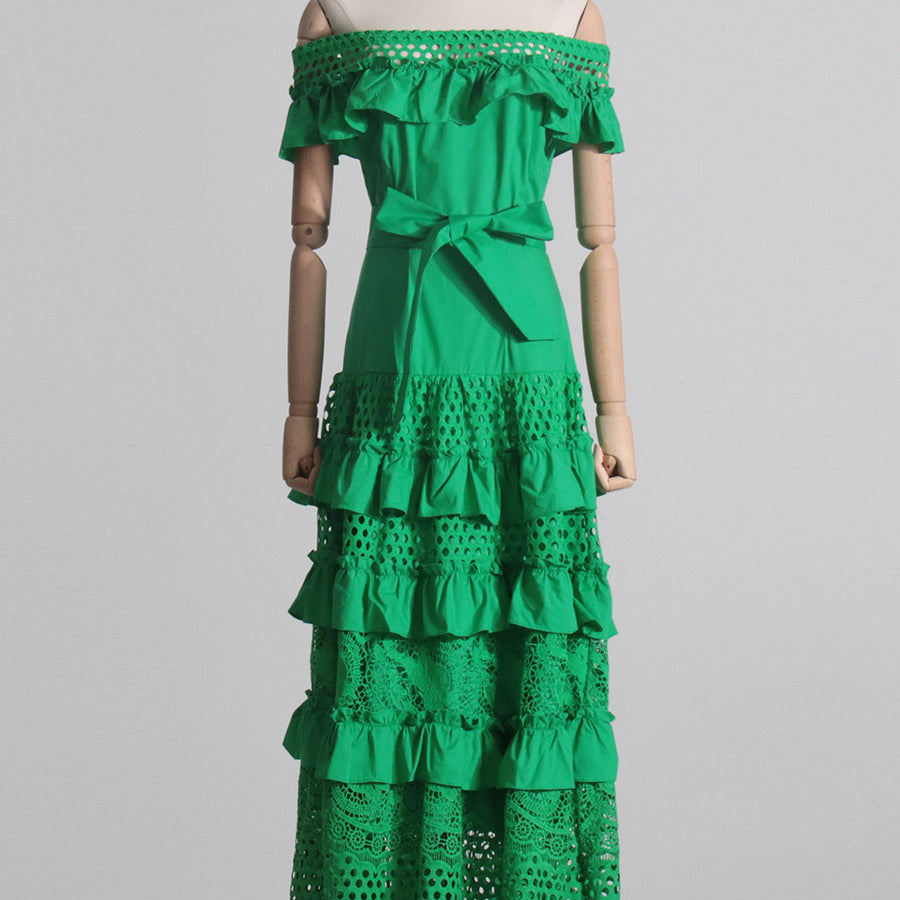 Green off-the-shoulder tiered dress showcasing elegant fashion and ملابس for women