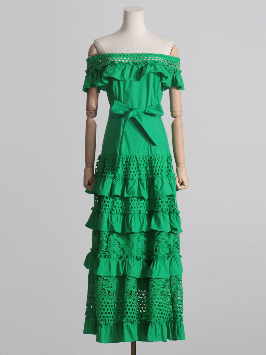 Green off-the-shoulder tiered dress showcasing elegant fashion and ملابس for women