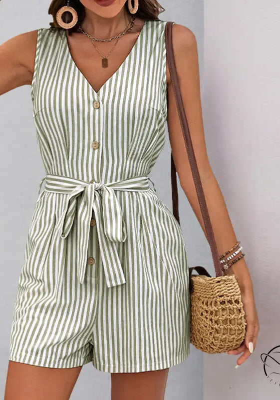 Beautiful summer jumpsuit: sleeveless green and white striped romper with button front and tie waist