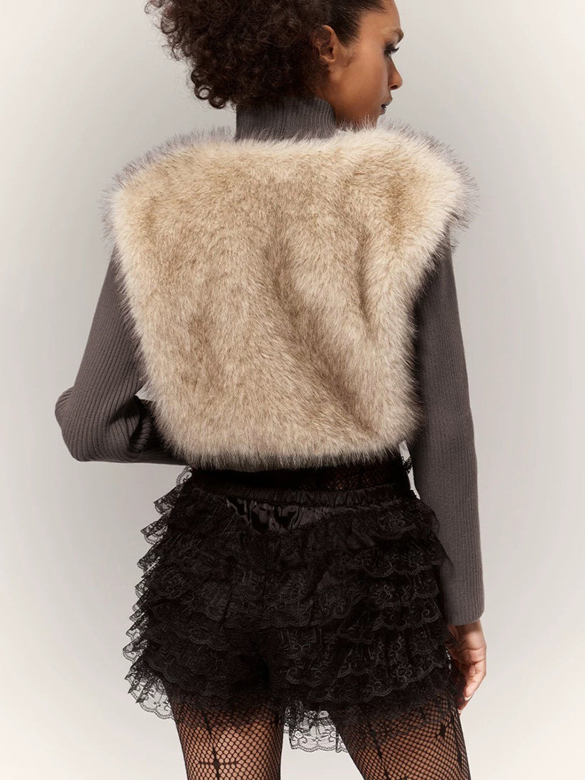 Langry fashion beige faux fur cropped vest with lace skirt and fishnet stockings