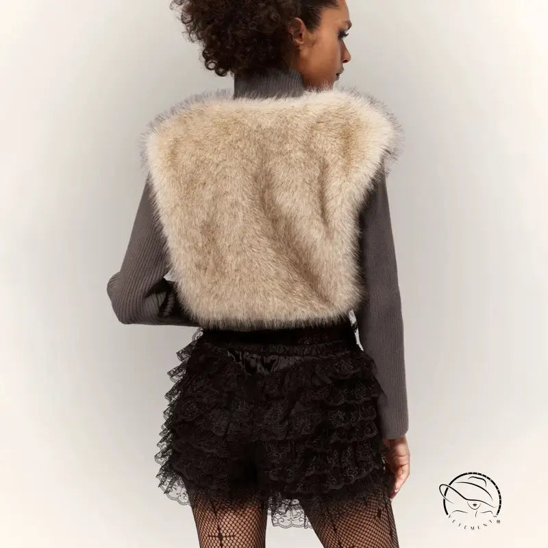 Beige faux fur langry cardigan coat with ruffled lace skirt and fishnet stockings