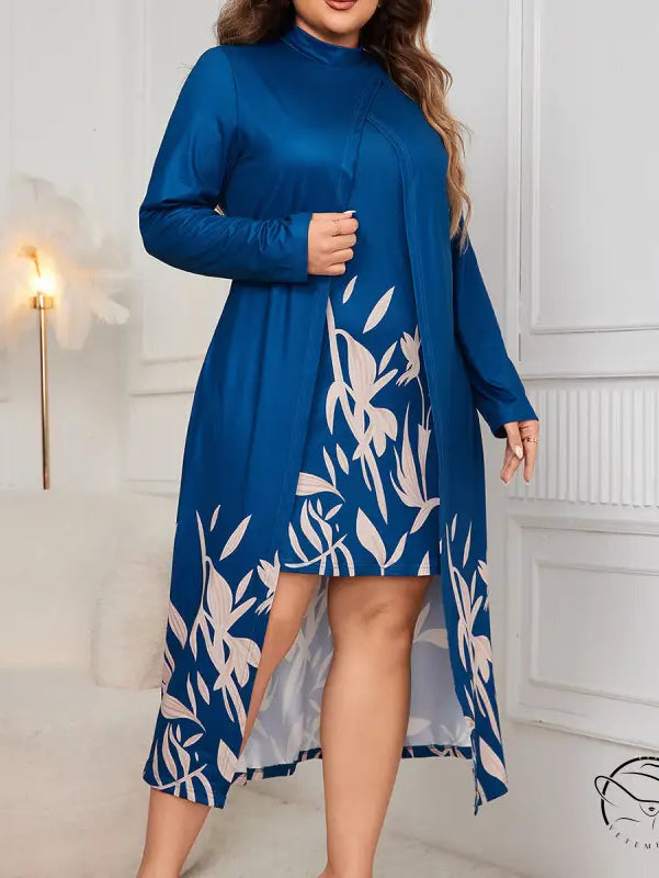 Faux two piece long sleeve dress with blue top and leaf skirt