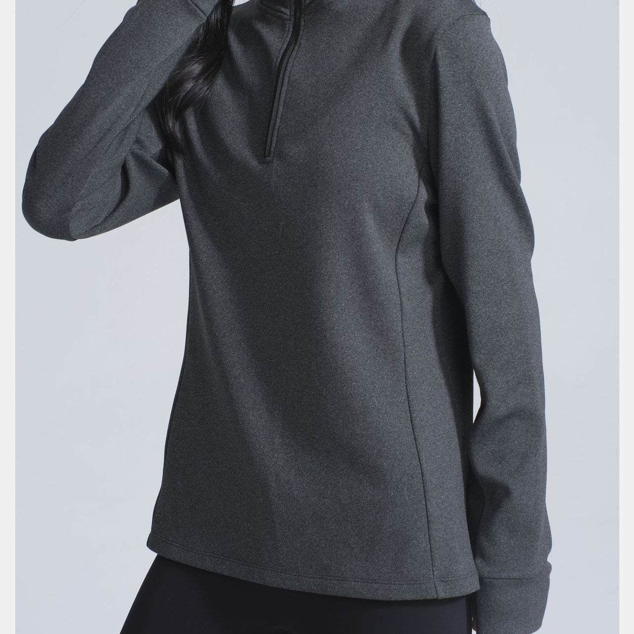 Dark gray long-sleeve athletic top with quarter-zip for winter thermal yoga fashion