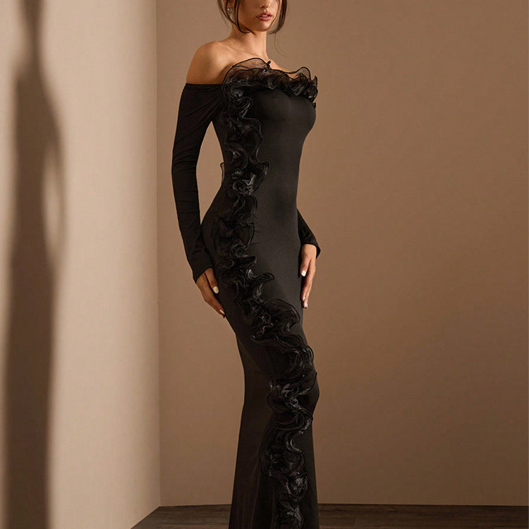 Elegant off-the-shoulder black maxi dress showcasing luxurious fashion for sophisticated occasions
