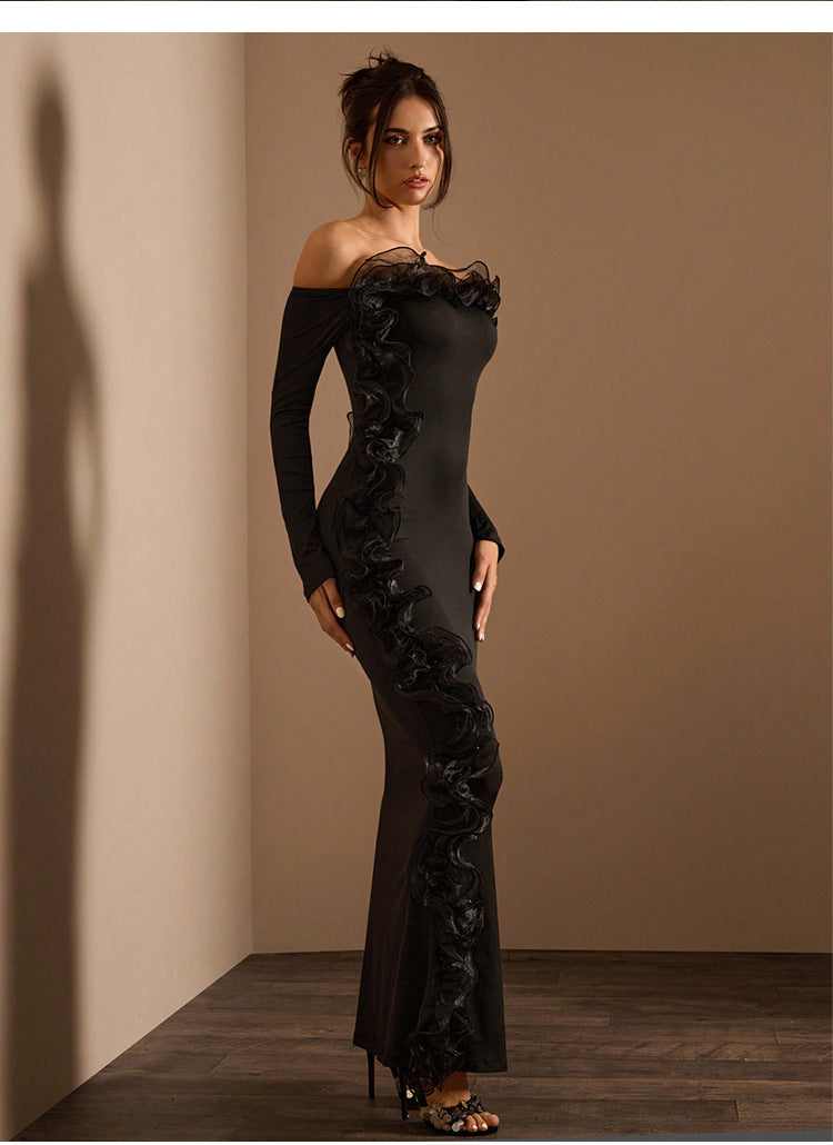 Elegant off-the-shoulder black maxi dress showcasing luxurious fashion for sophisticated occasions