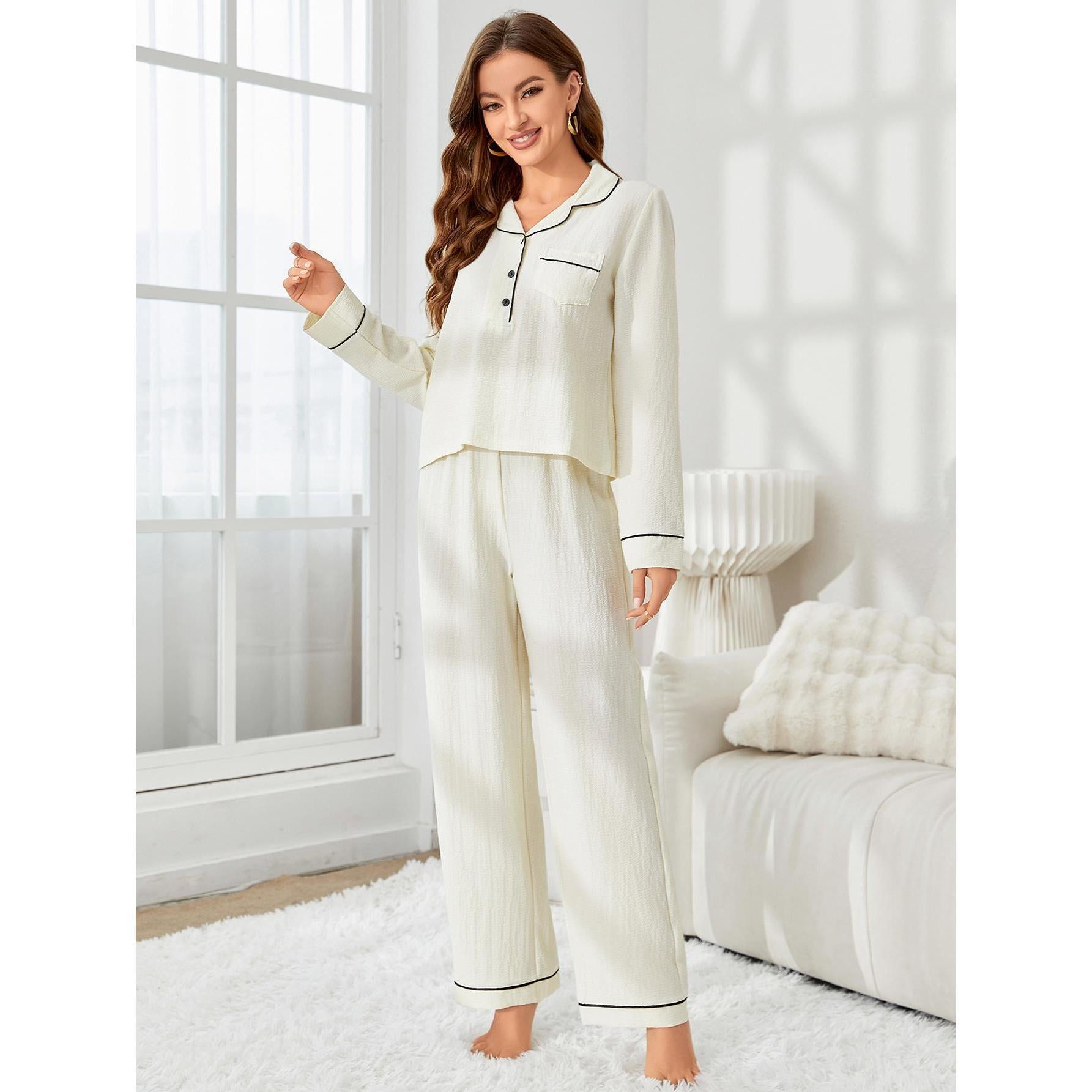 Off-white two-piece pajama set with black piping, stylish home wear for women