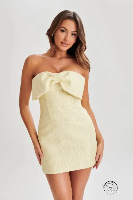 Slim fit yellow strapless mini dress with bow bust detail