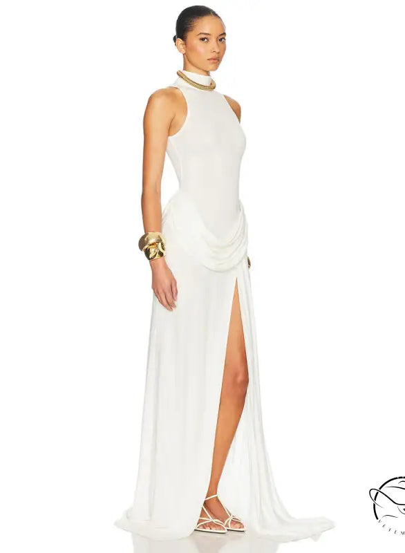 Gorgeous white halter neck gown with high split and tight waist