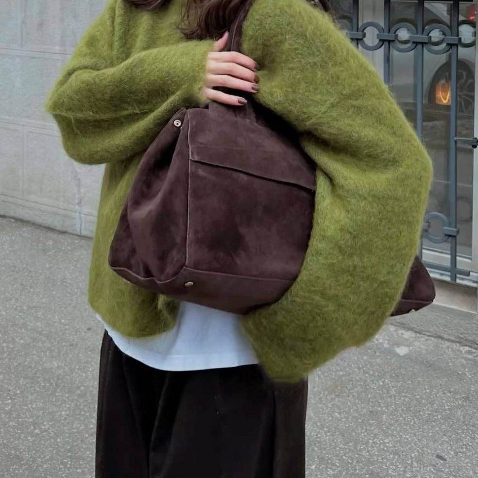 Olive green wool alpaca fuzzy sweater with brown leather bag