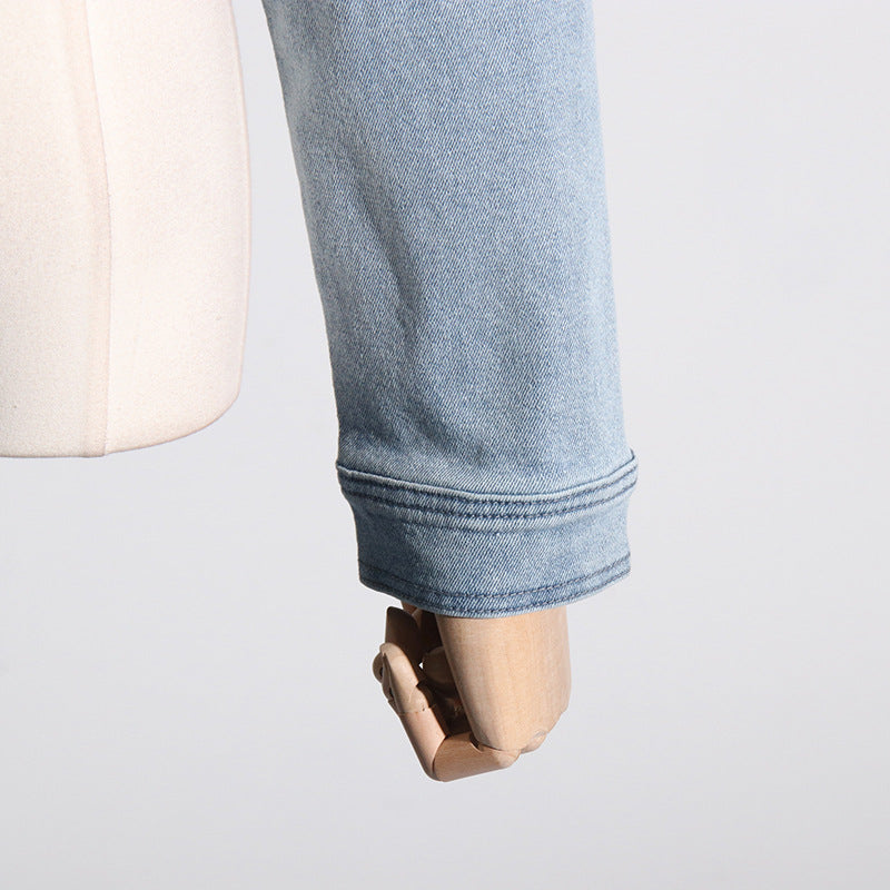 Light blue denim jacket sleeve from the Off the Shoulder Design Denim Jacket for stylish fashion