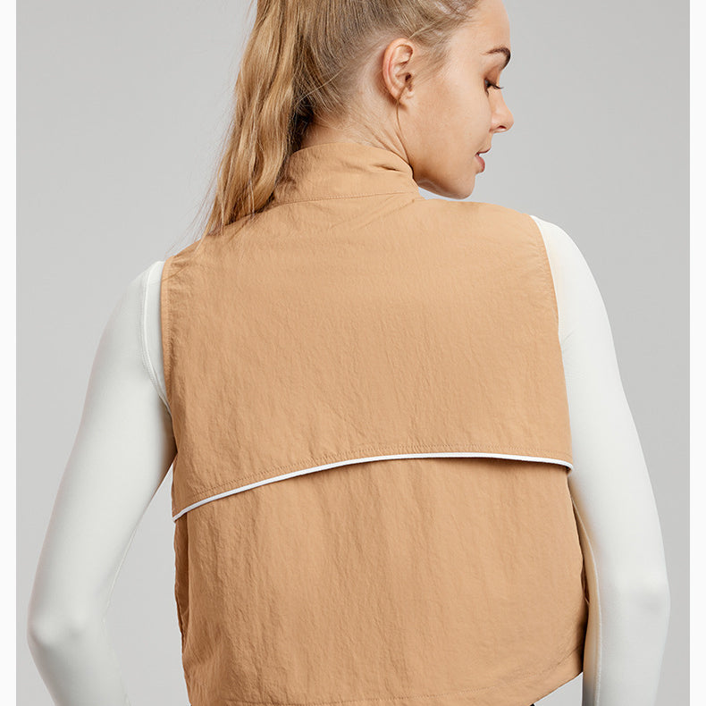Tan sleeveless vest with white trim in the Comfy Loose Sports Vest for trendy langry ملابس
