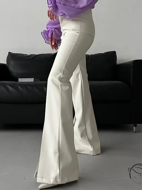 Cream-colored flared winter faux leather slit pants