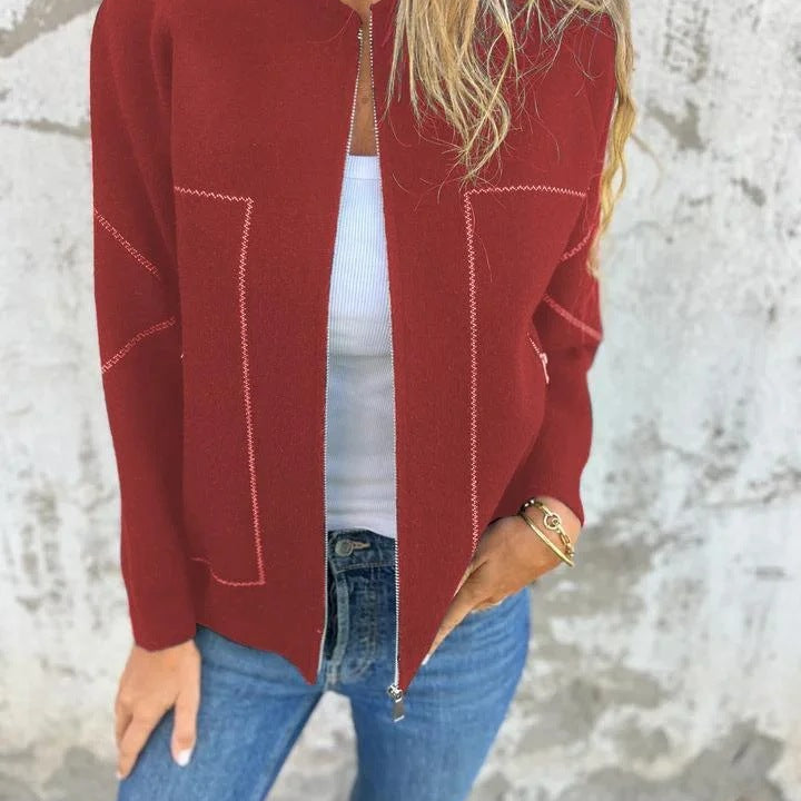 Red zip-up cardigan with white stitching, perfect for langry fashion and ملابس styling