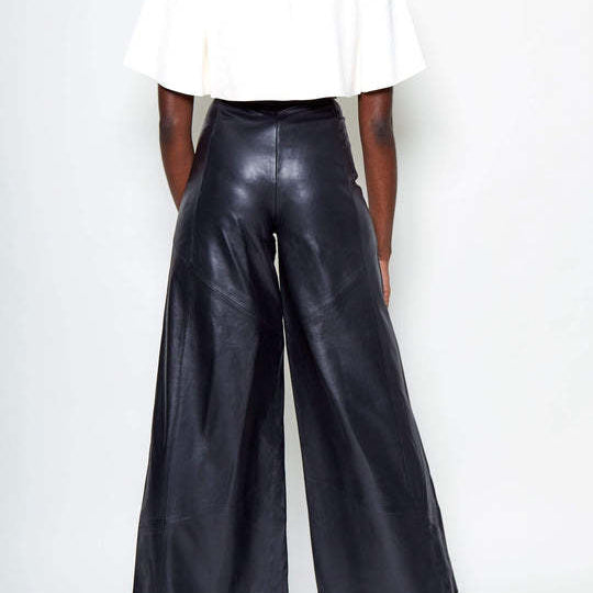 Women’s black faux leather wide-leg bell bottom pants showcasing trendy langry fashion style
