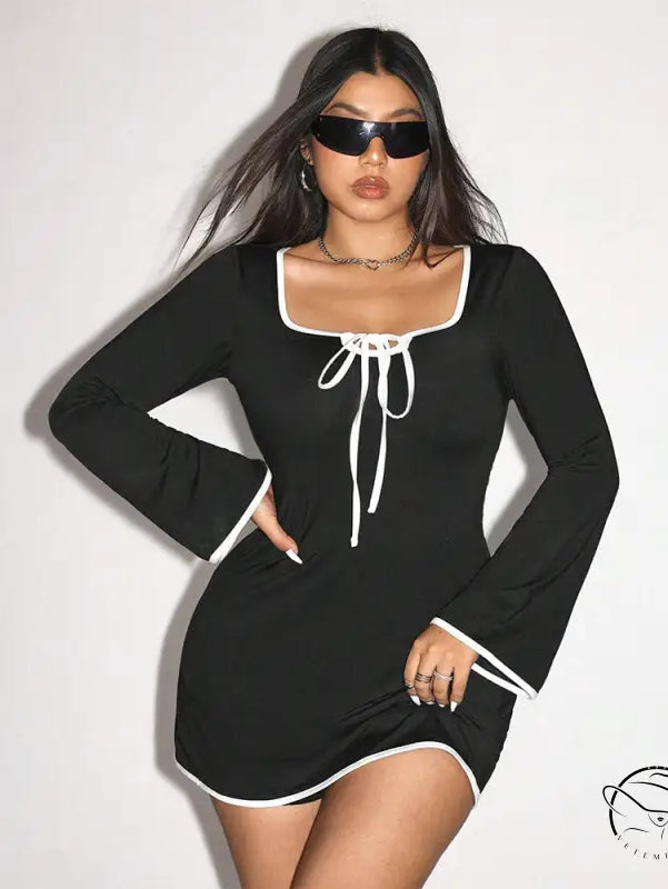Elegant sweet spicy black mini dress with white trim