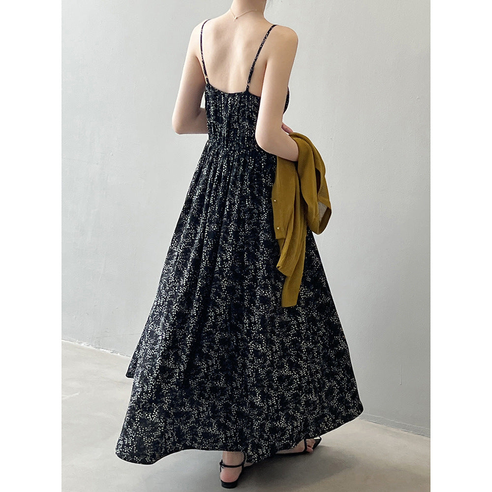 Elegant floral strap dress featuring French floral pattern and maxi length for style