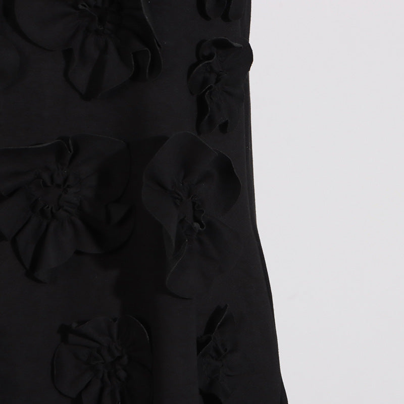 Black floral-appliqued fabric with tie bow detail from the Retro Socialite fashion collection