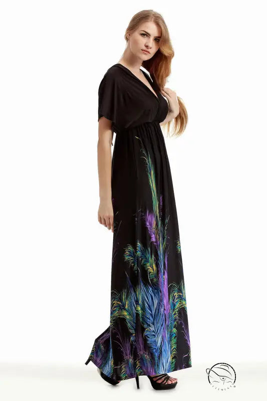 Holiday beach dress with black maxi style and colorful feather print