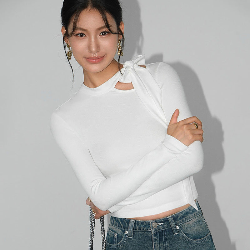 Woman in white long-sleeve top from Simple round Neck Slim Fit Top collection, stylish ملابس