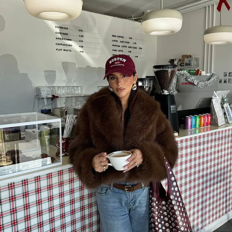 Gorgeous faux fur fox jacket with brown coat, red cap and polka dot bag