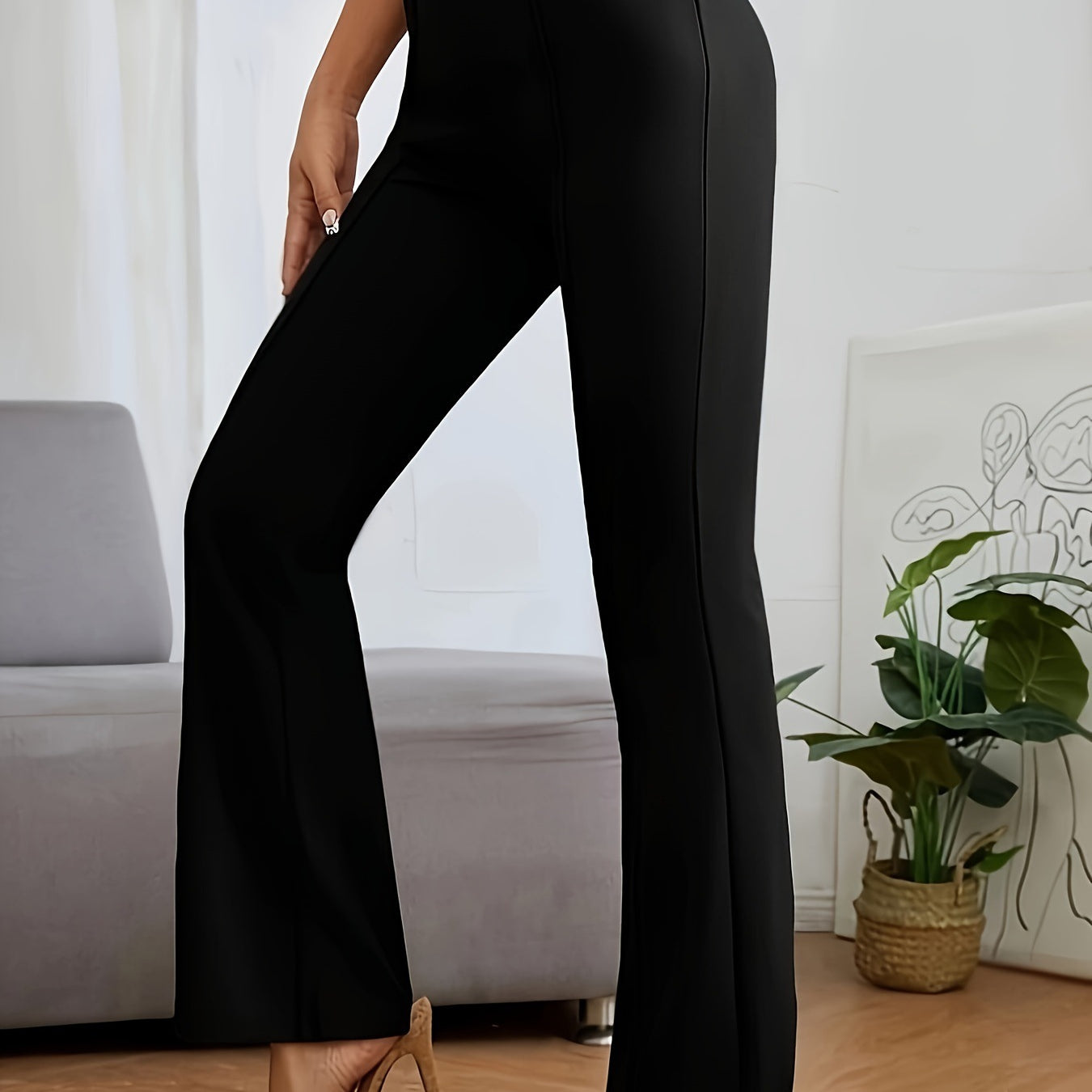 Black flared dress pants with high waist and metallic stiletto heels for casual fashion