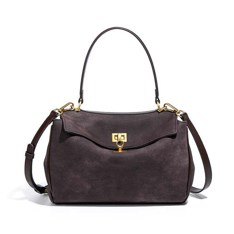 Brown leather handbag with gold hardware from the Original Frosted Deerskin Bag, langry fashion