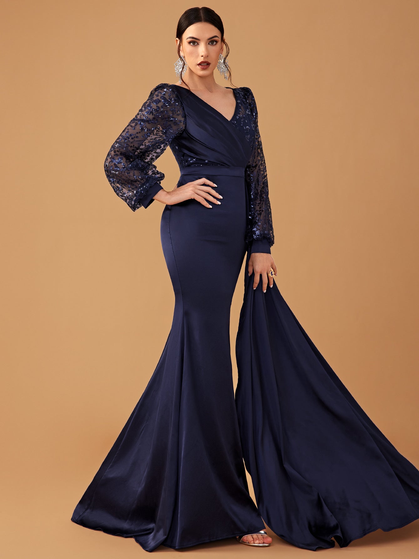 Elegant navy blue evening gown showcasing sophisticated fashion design and style