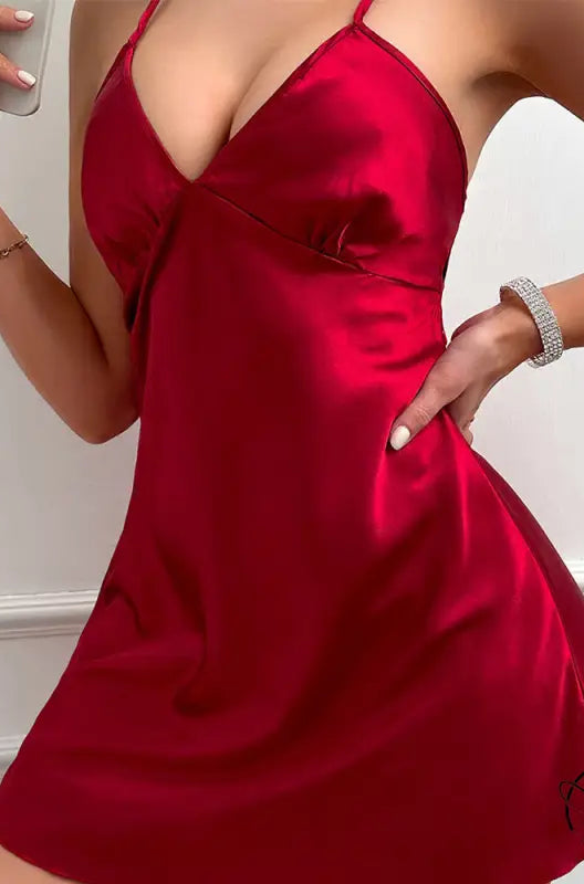 Vibrant red langry satin slip dress with deep v-neck and spaghetti straps