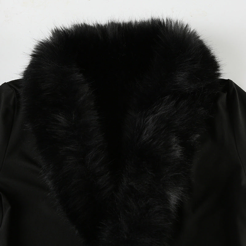 Elegant fur collar black top showcasing luxurious fashion and stylish ملابس for sophistication