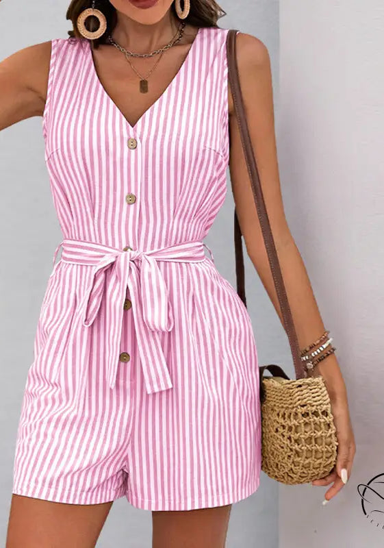Beautiful summer jumpsuit: pink and white striped sleeveless romper with buttons and tie waist
