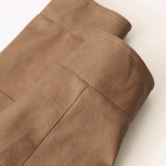 Brown leather boots styled with a high quality casual leather coat for langry fashion and ملابس