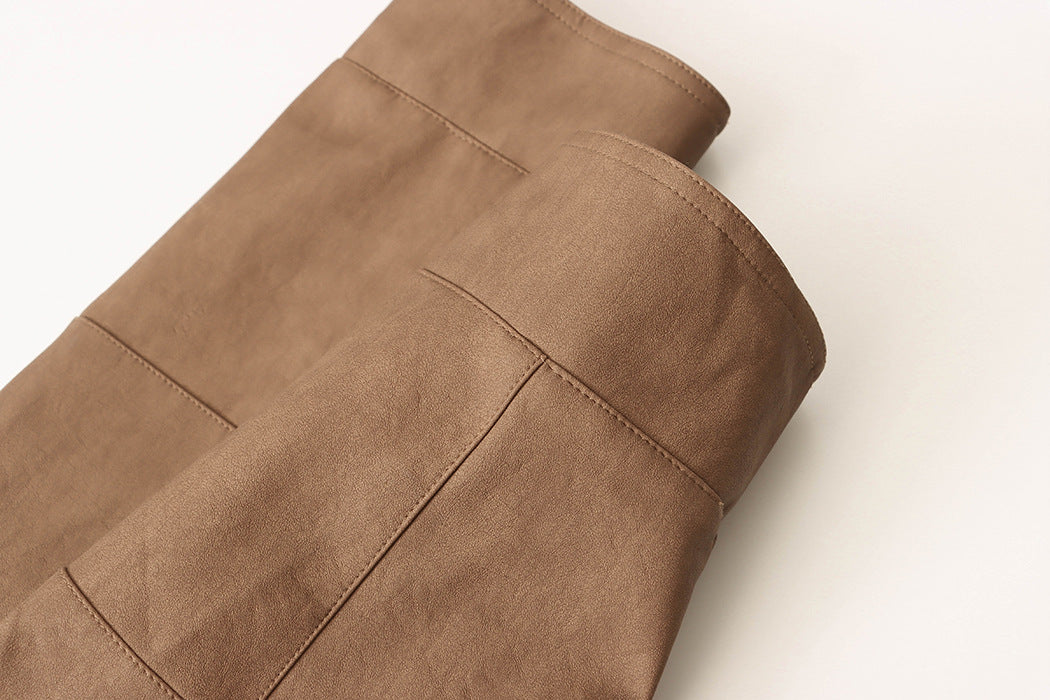 Brown leather boots styled with a high quality casual leather coat for langry fashion and ملابس