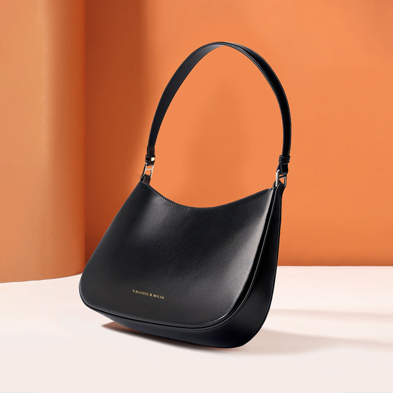 Black leather shoulder bag from Special Interest Design Bag, stylish fashion accessory