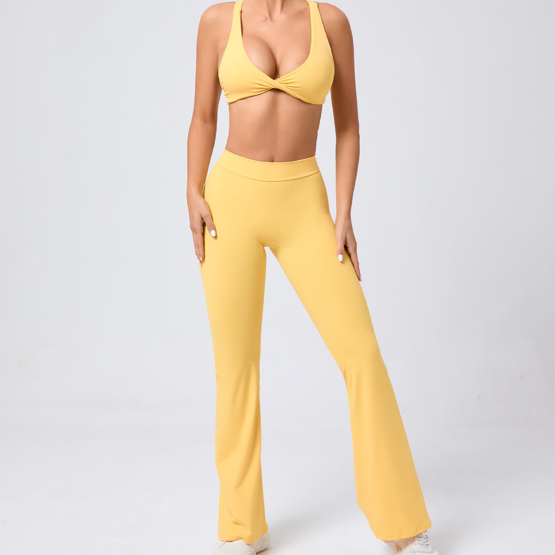 Peach tight brushed yoga pants with ribbed texture and white sneakers