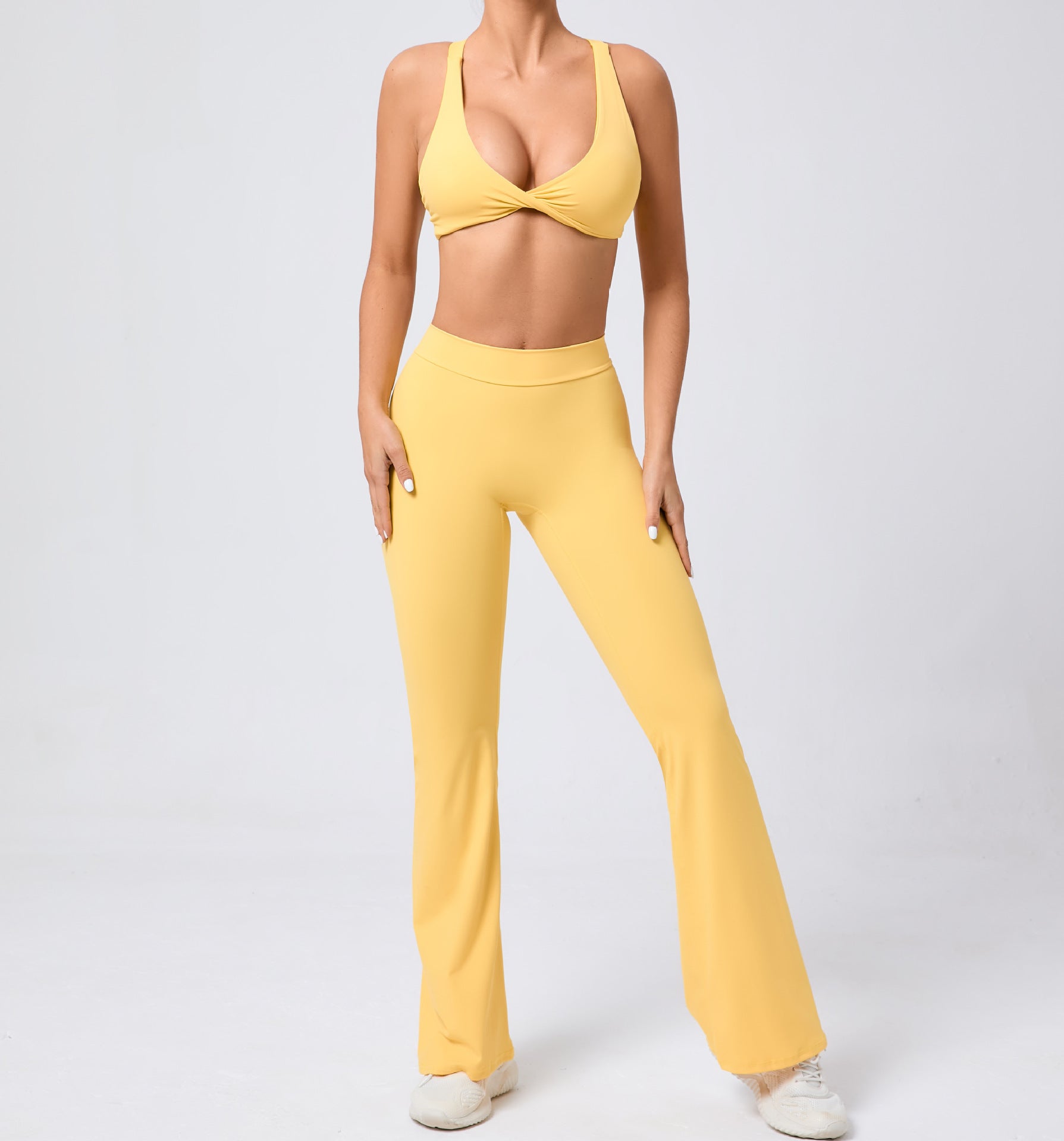 Peach tight brushed yoga pants with ribbed texture and white sneakers