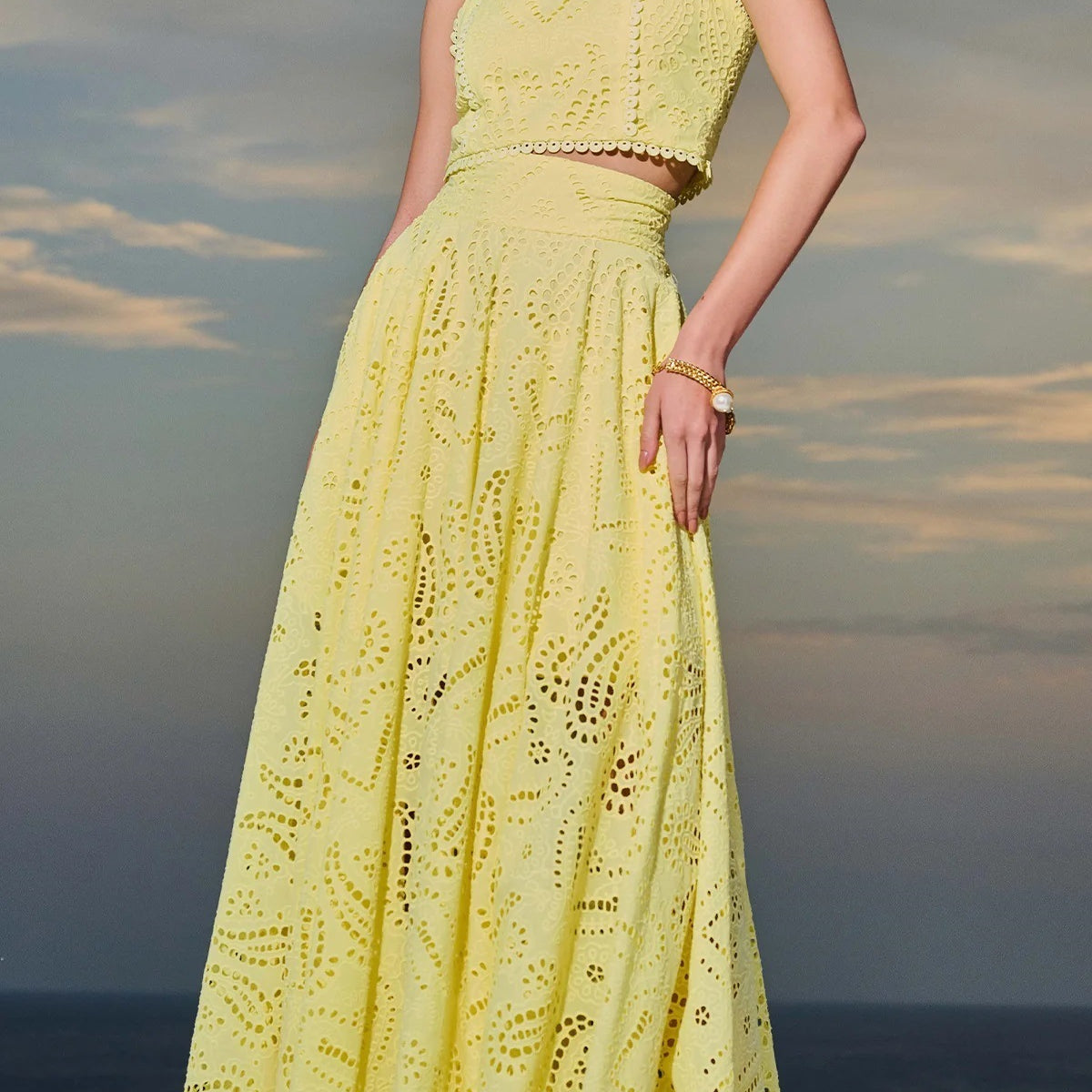 Yellow eyelet two-piece dress from Langry, ideal for casual vacation fashion ملابس