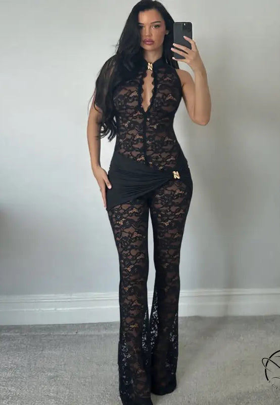 Black lace langry fashion jumpsuit with flared legs and deep neckline